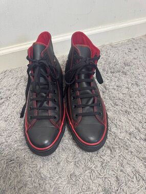 Converse Black High-Top Sneakers with Red Accents